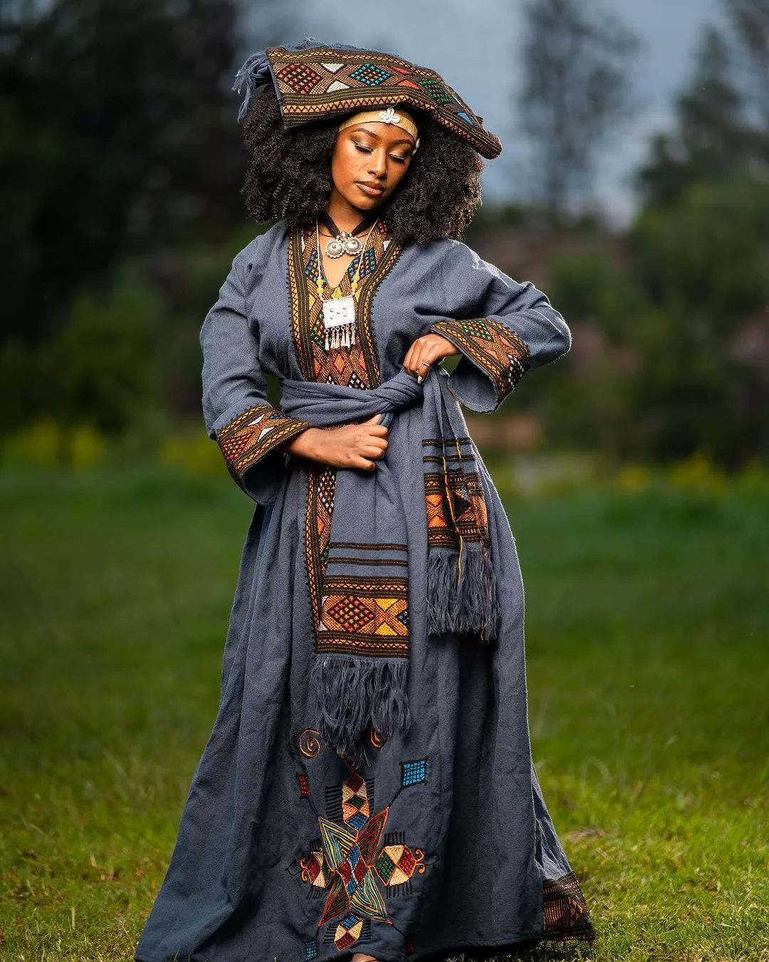 Elegance in Indigo: Exploring the Intricacies of the Habesha Kemis