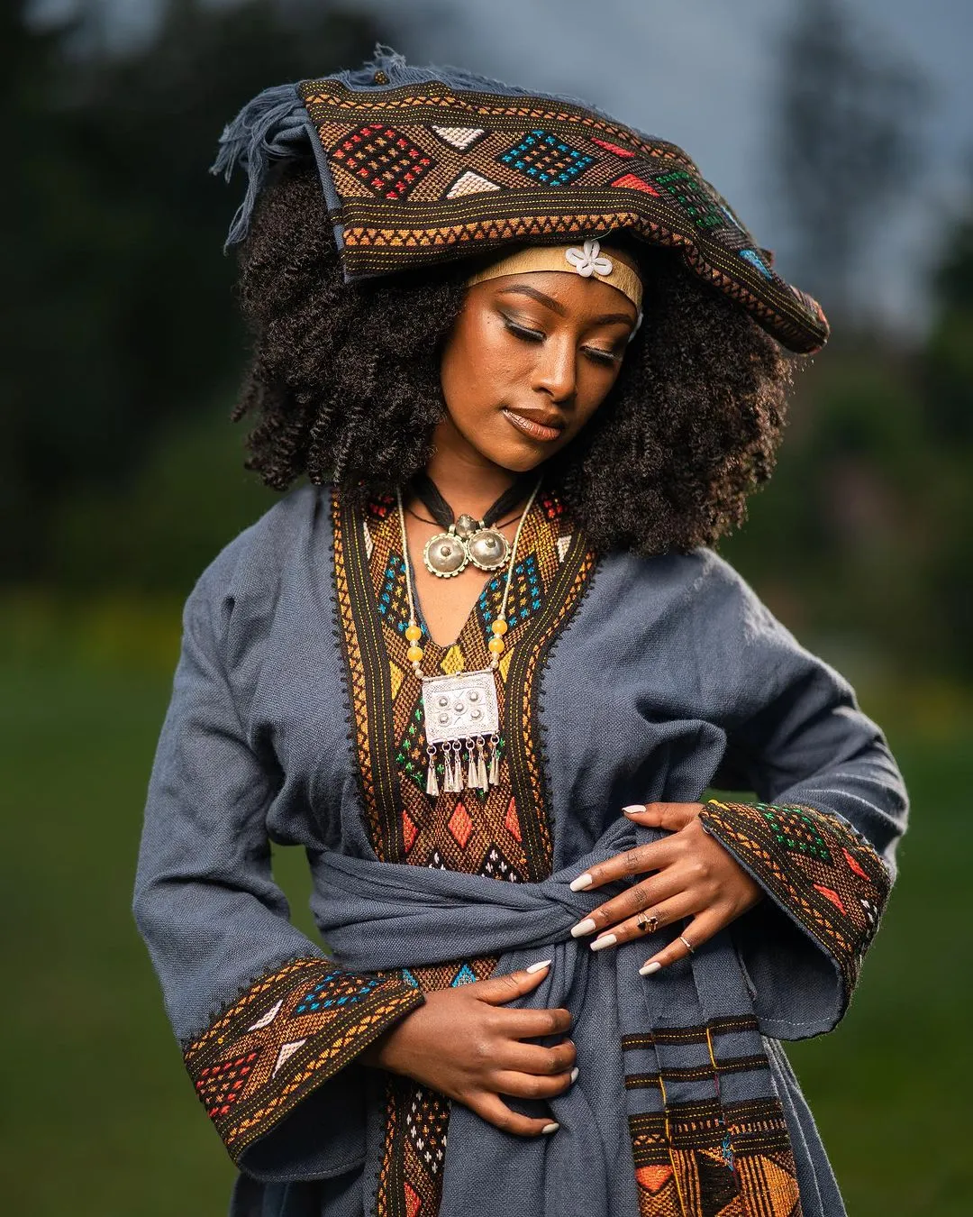 Elegance in Indigo: Exploring the Intricacies of the Habesha Kemis