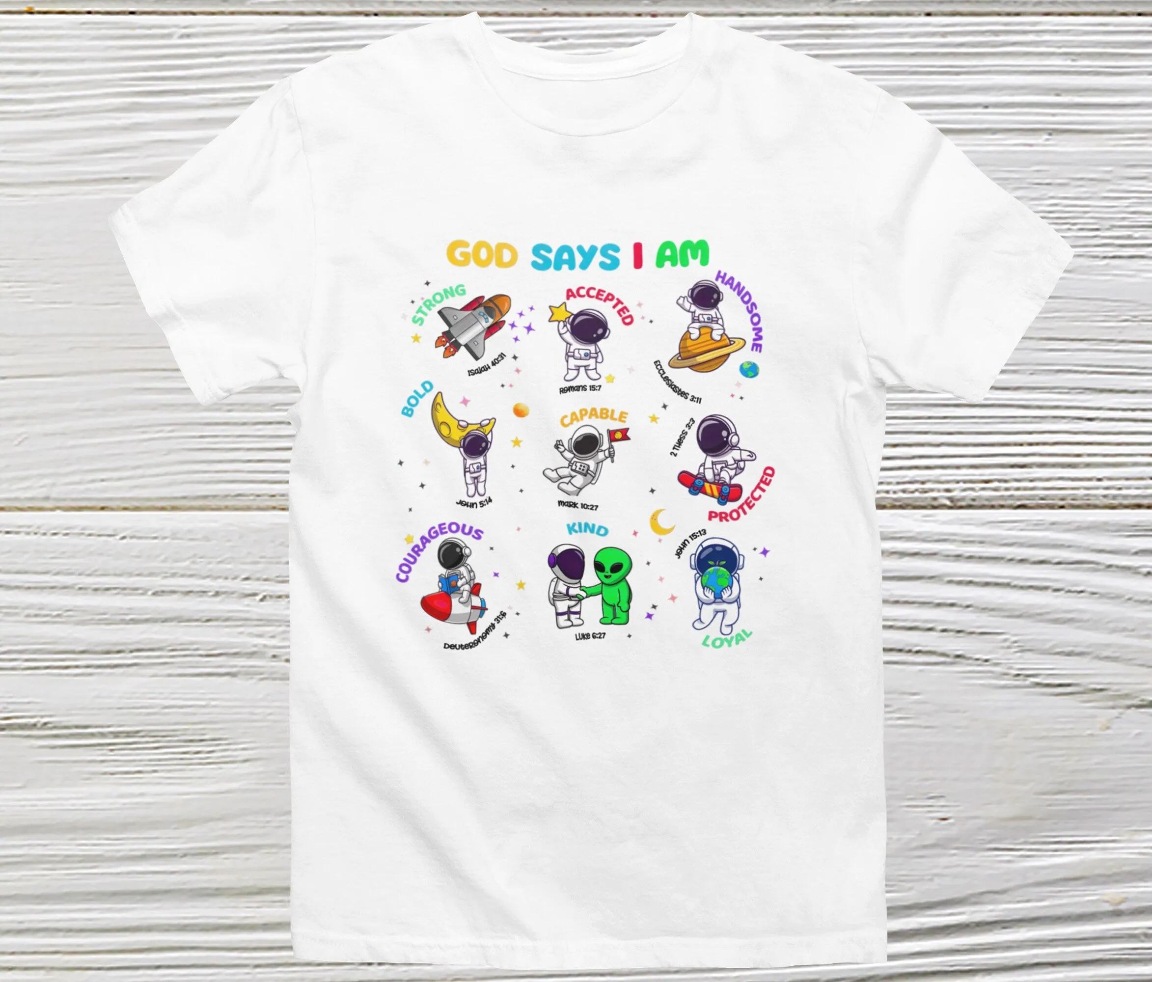 God Says I Am Bible Verse Shirt Embark on a cosmic journey with our Astronaut Space Ship Lover Bible Verse Shirt. Elevate your style with interstella