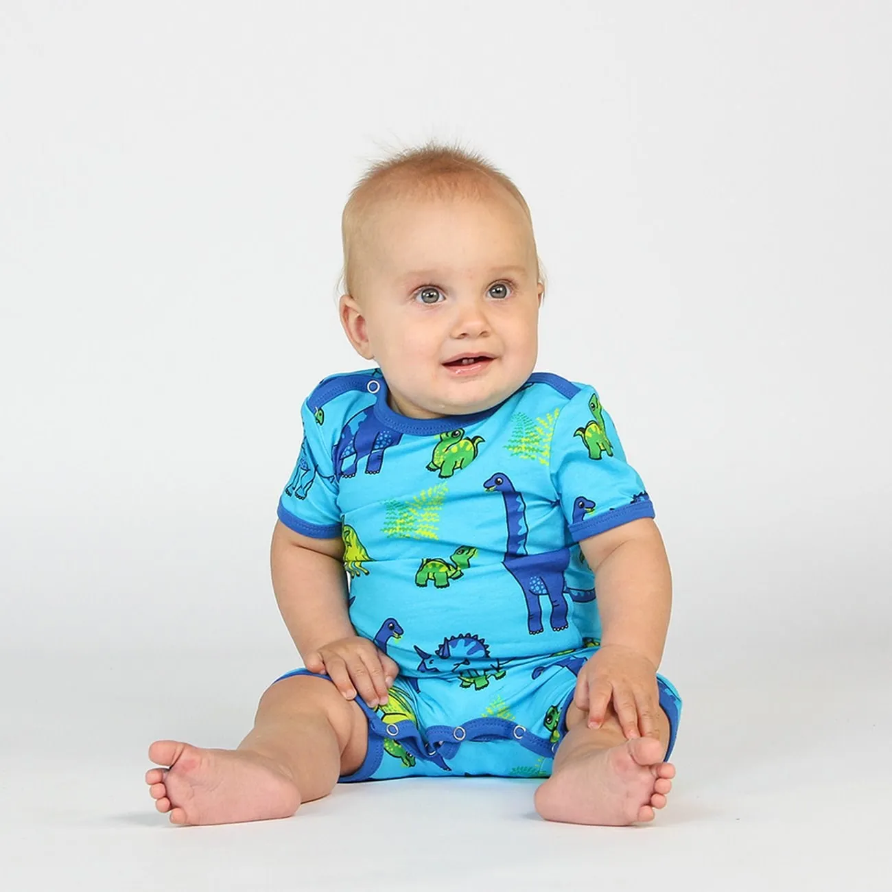 Småfolk Blue Atoll Short-Sleeved Jumpsuit With Dinosaur